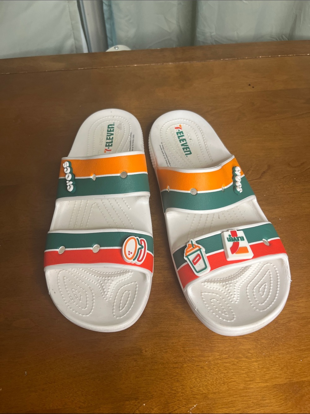 CROCS Kids' White Slides with Orange, Green & Red Stripes